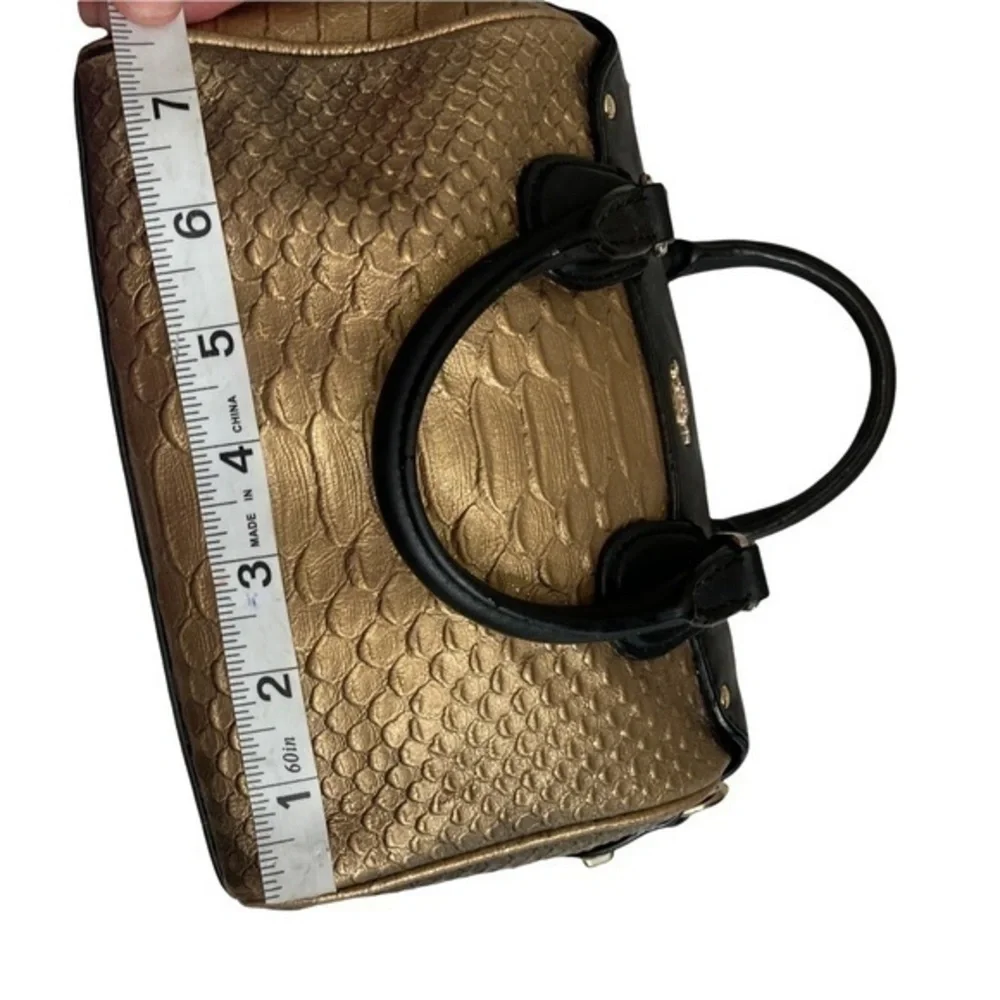 Coach gold embossed leather mini barrel bag